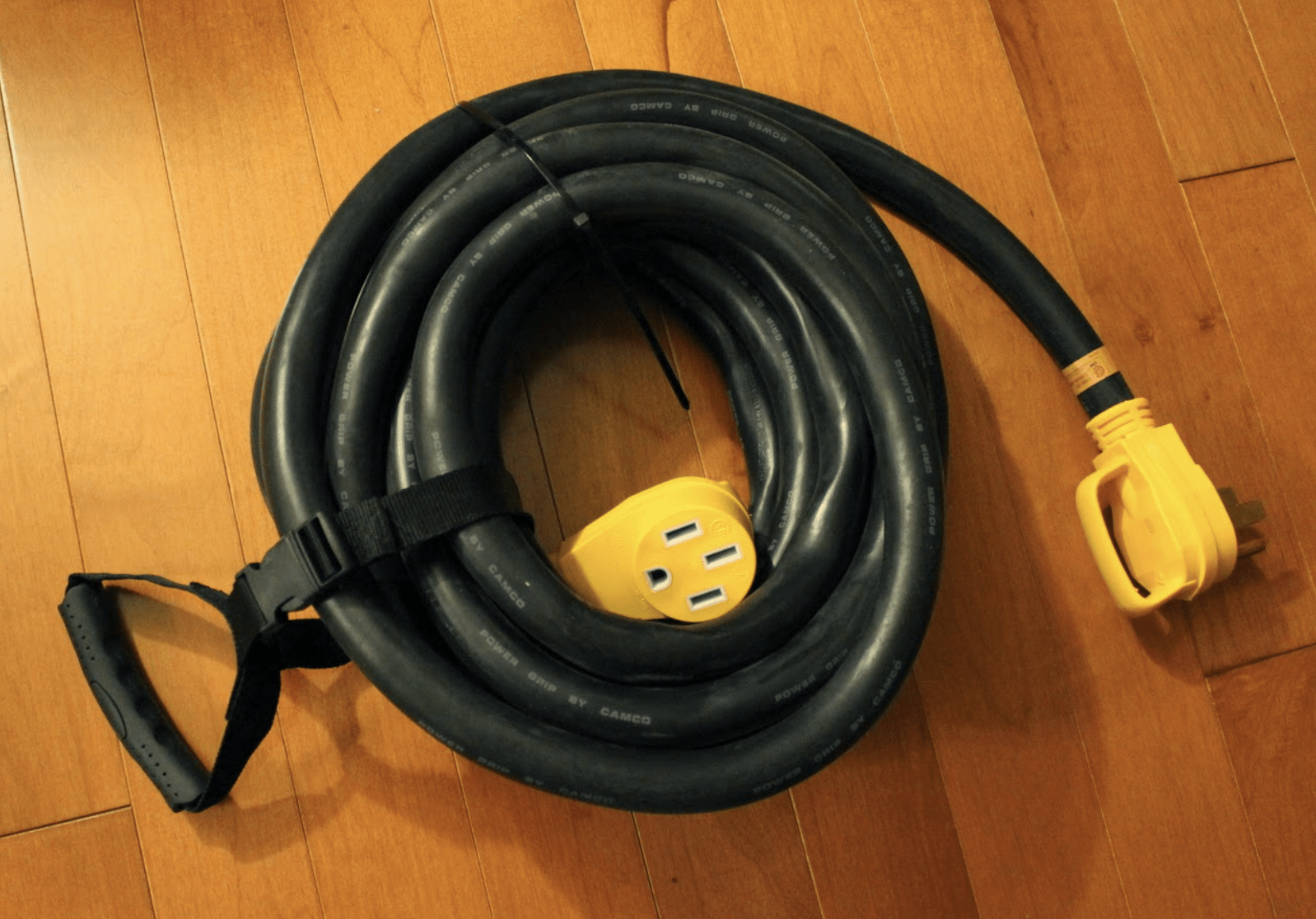 Camco 25' PowerGrip Cord with 50M/50F-90 Degree Locking Adapter